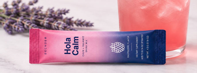 Hola Calm stick pack beside a prepared drink